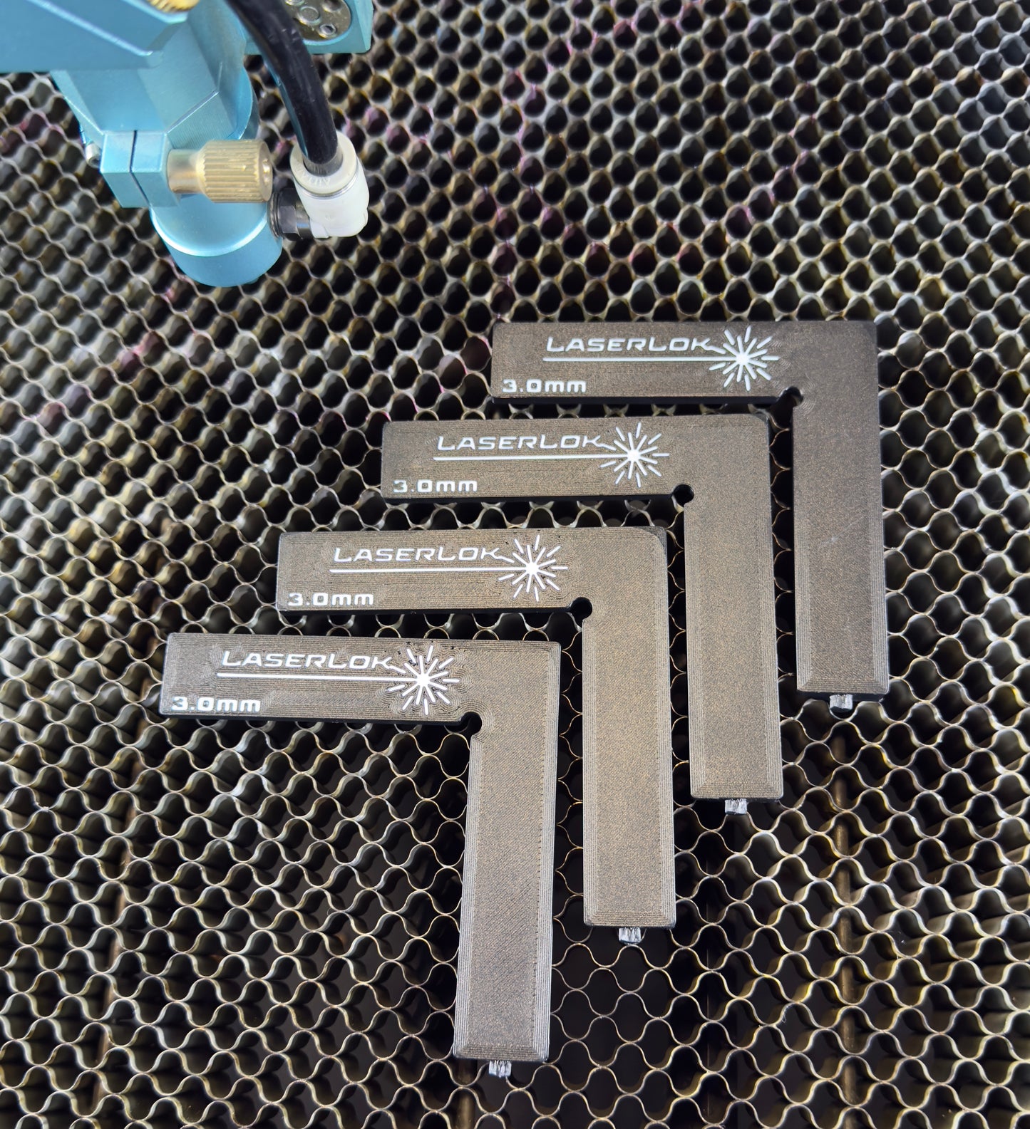 LaserLok™ Magnetic L-Corners designed for squaring on your laser bed